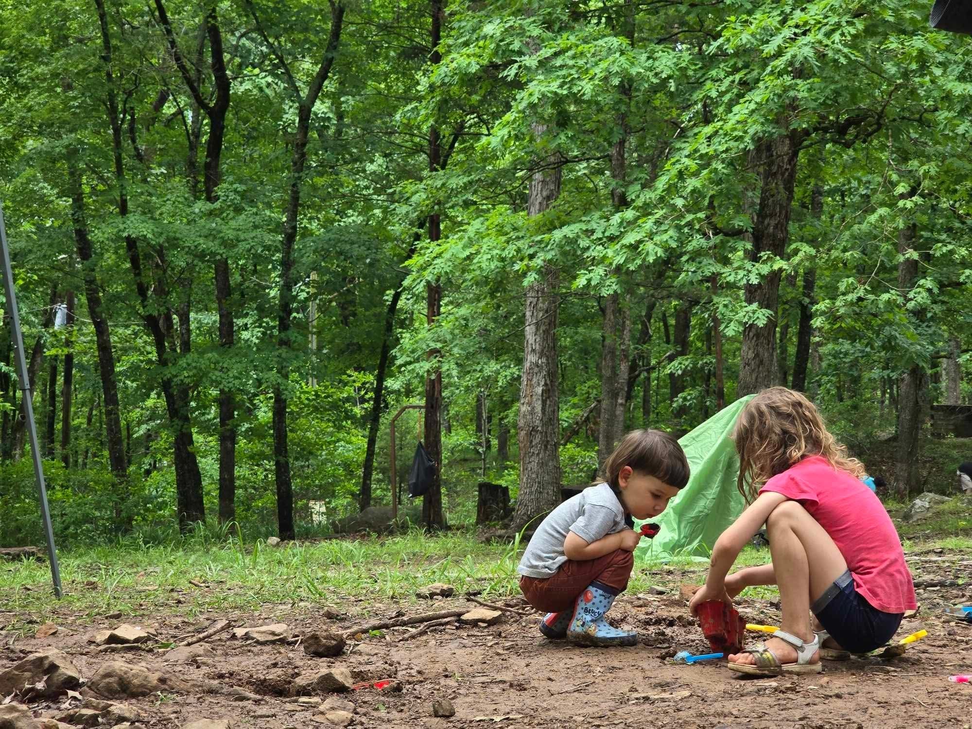 Children camping in the forest